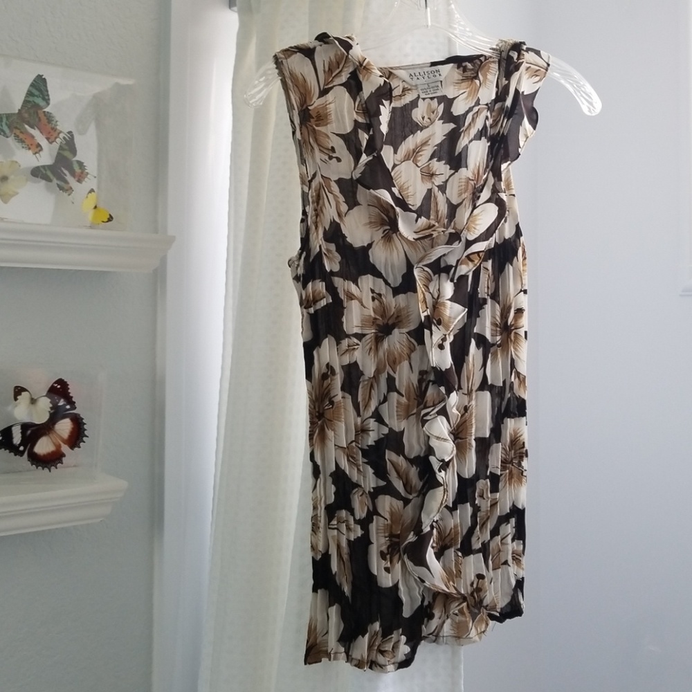 Semi sheer sleeveless blouse